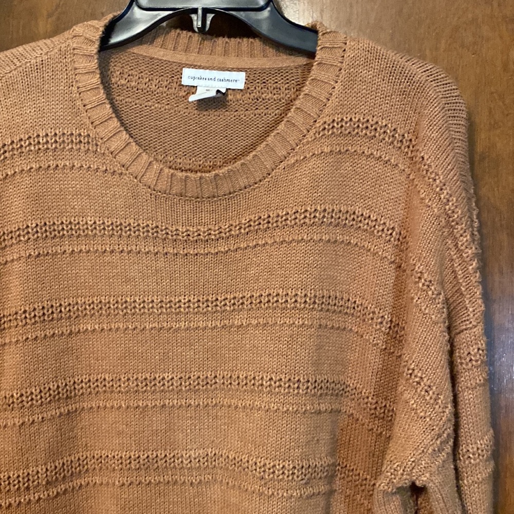 cupcakes and cashmere designer sweater